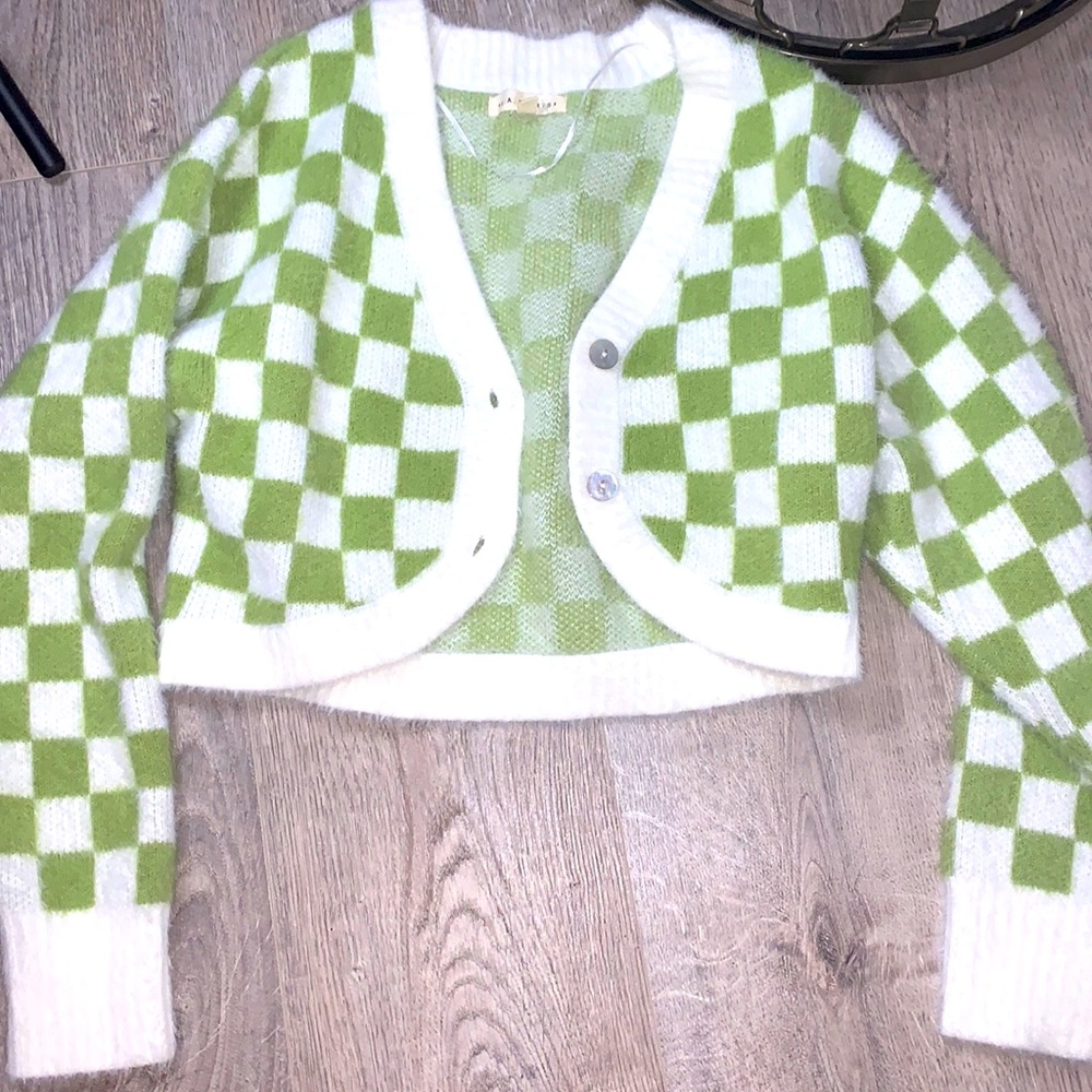 A plad green and white cardigan. Very soft.